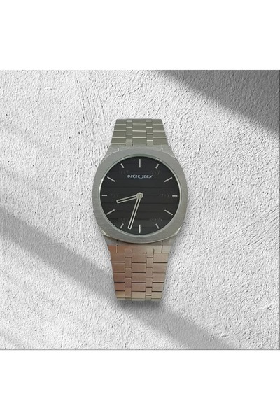 DIVAR JEEN The elegant "DIVAR JEEN" men's wristwatch - a classic silver desig...