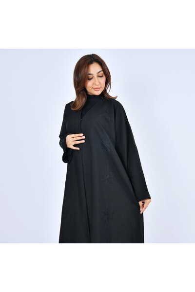 LAMHA A black everyday abaya, closed with a snap closure and decorated with a...