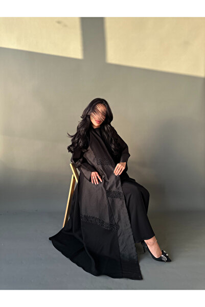 outline Black quarter-circle abaya with beaded details and a mix of taffeta a...