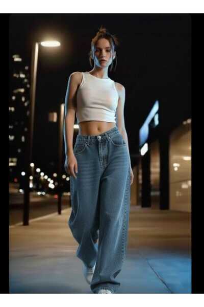 Trn JNS جينز فضفاض من أفريل بغسيل حمضي ولون أزرق مع تفاصيل مشبك وقصة واسعة