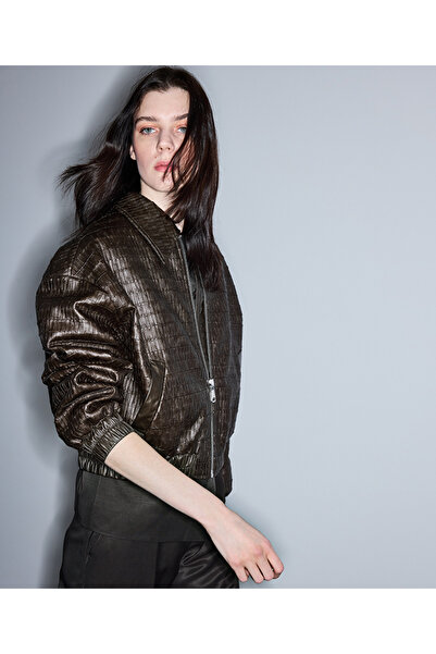 İpekyol Dokulu deri görünümlü mont