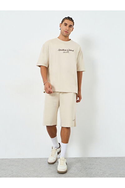 Styli Men Beige Graphic Oversized T-Shirt and Shorts Co-Ords