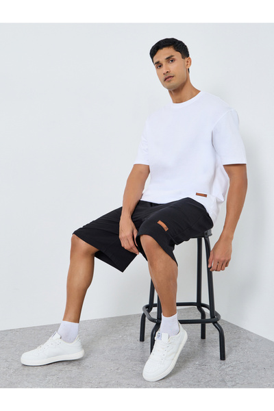 Styli Men Oversized Badge Detail T-Shirt and Shorts Co-Ords