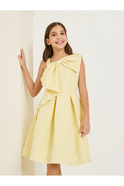 Styli Girls Yellow Sleeveless Pleated Dress with Bow Detail