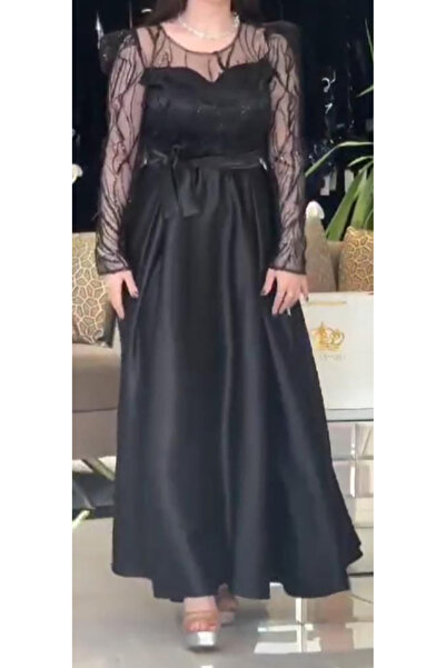 Sweety Fashion فستان سهرة أسود فاخر يجمع بين نعومة الساتان وجاذبية التول المطرز
