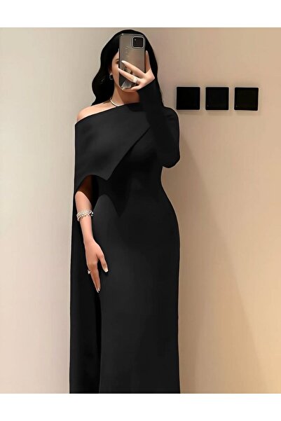 Ta Prince An elegant evening dress with a one-shoulder design and a fitted si...