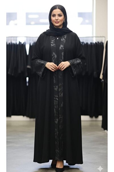 ROOZ VIP A black open abaya with an elegant and comfortable design, featuring...