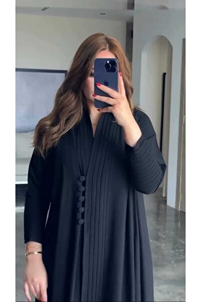 ROOZI A formal and elegant abaya with pleated details at the front and on the...