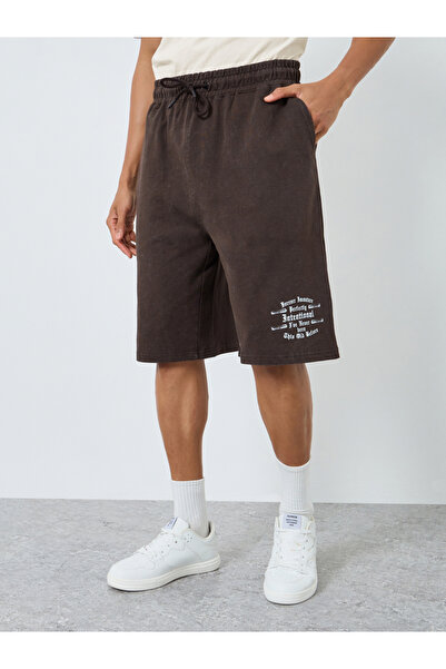 Styli Men Oversized Acid Washed Distress Print Shorts