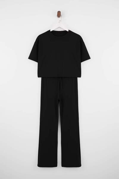 Trendyol Collection Black Relaxed Low Arm Short Sleeve Pipe Leg Cotton Rib Kn...