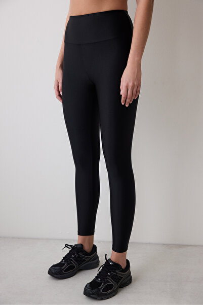 Penti Glänzende schwarze Strumpfhose