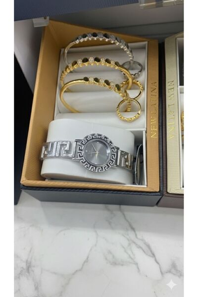 Boutique Women's Accessory Set: Luxury Wristwatch with a Selection of Bracele...