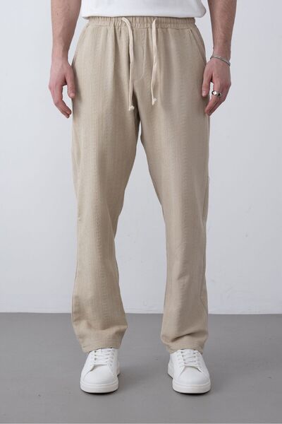 TÜZeMEN Textured Baggy Fabric Trousers with Rope Detail