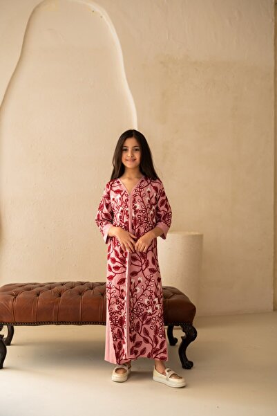 Braids Elegant jalabiya with delicate embroidery, suitable for various occasi...