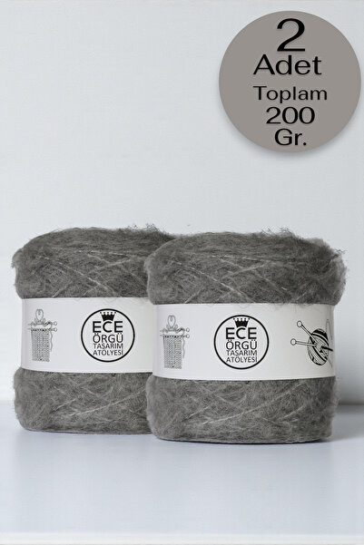 Ece Örgü Tasarım Atölyesi Koyu gri, bol tüylü, orta kalınlıkta moher örgü ipi...