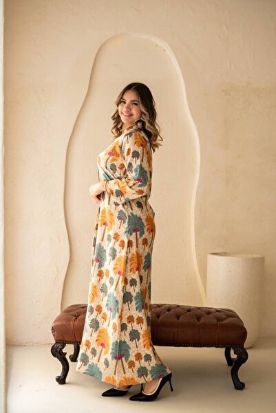 AFandina Jalabiya with delicate nature-inspired patterns for a serene and ele...