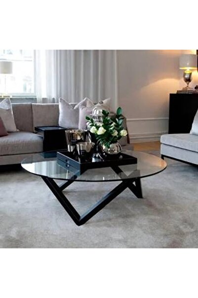CN A black base coffee table with a clear glass top - elegant and luxurious d...