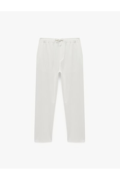 Koton Pantaloni din material textil cu șireturi în talie și buzunare, cu potr...