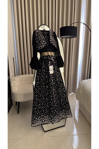 Nareen Fashion An elegant black jalabiya with a sophisticated design that com...