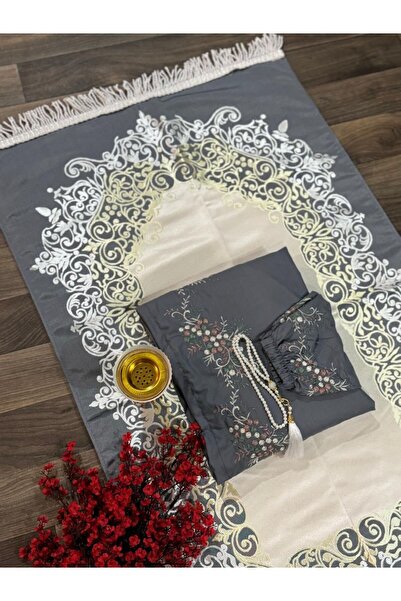 ssd A complete set including a prayer rug, prayer mat, prayer beads, rosary r...