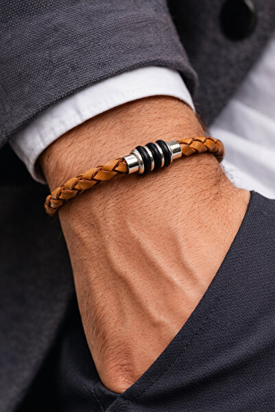 HER ŞEY NOTA www.herseynota.com Terra Core – Tan Braided Leather & Steel Ring...
