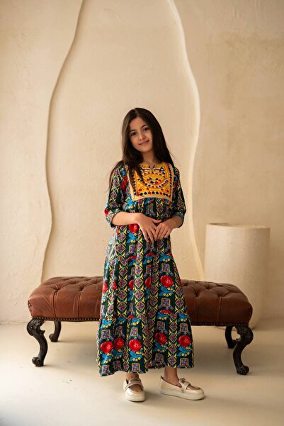 AFandina Shalki jalabiya with colorful patterns and prominent embroidery adds...