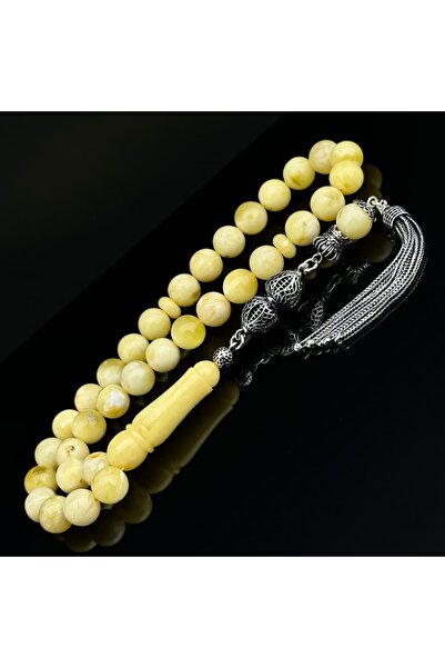 Tasarım حجر الكهرمان الطبيعي المقطوع على شكل كرة من كالينينغراد