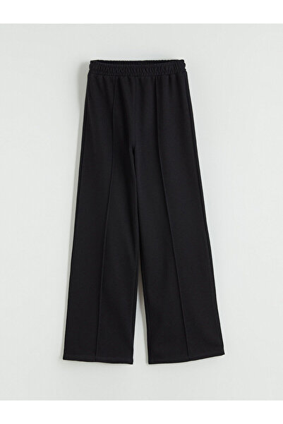 LC Waikiki Δημιουργήστε το στυλ σας με τα μαύρα ελαστικά παντελόνια φόρμας γι...