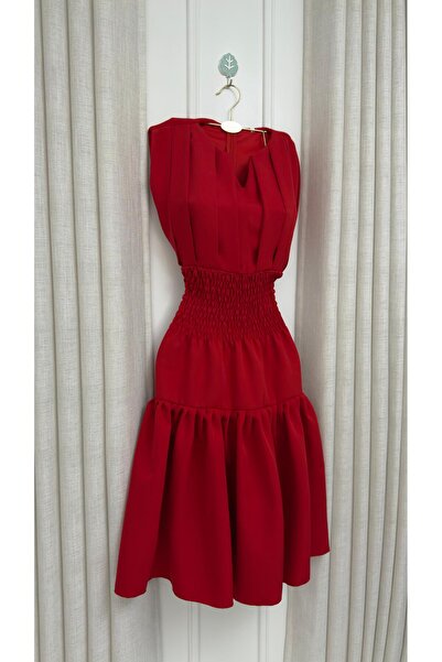 hind fashion Barbie's short red dress