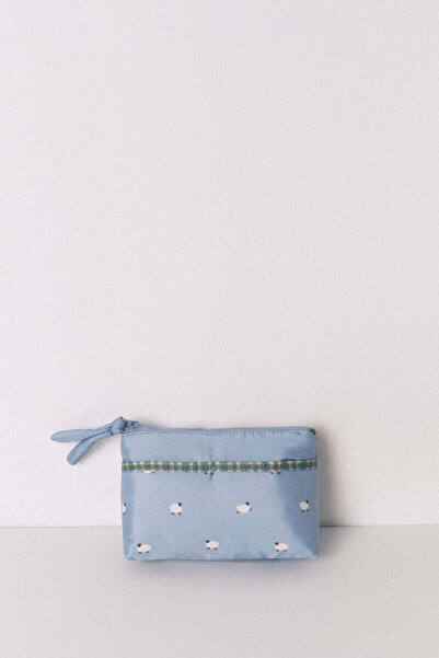 Women'secret حقيبة صغيرة لحفظ أغراض التجميل على شكل خروف، مزودة بسحاب.