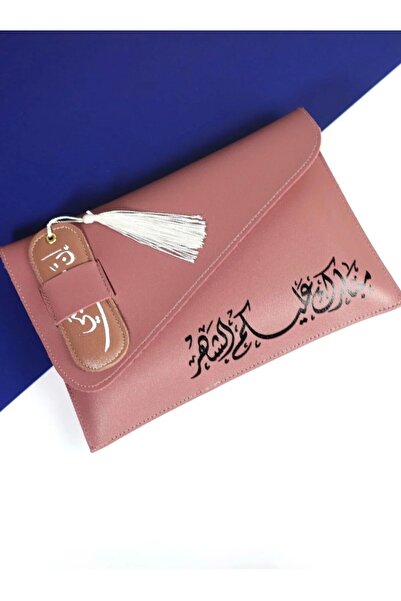 ceneric Leather pocket with the phrase "Blessed month to you" along with a le...