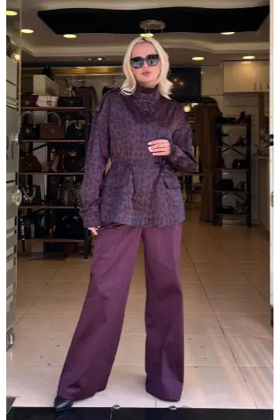 Unique سترة بومبر مزينة بنمط الفهد من قماش المظلة