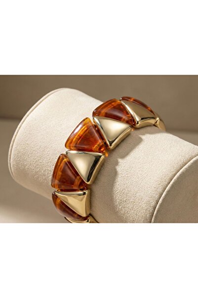 Snartun سوار نسائي مرن بحجر بني على شكل مثلث مع تفاصيل ذهبية، يأتي في علبة خاصة