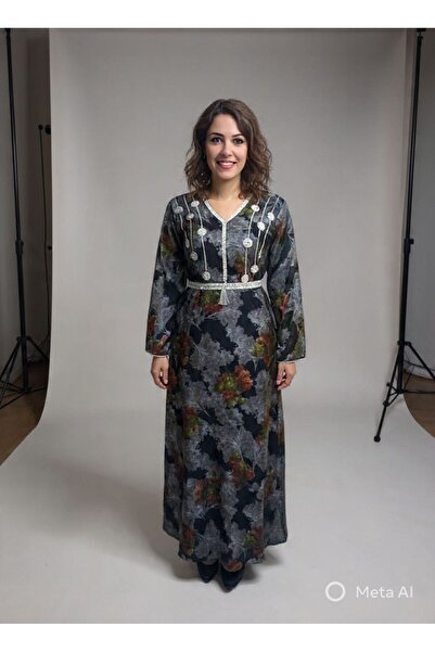 NALA FASHION An elegant jalabiya that exudes luxury and refined taste.