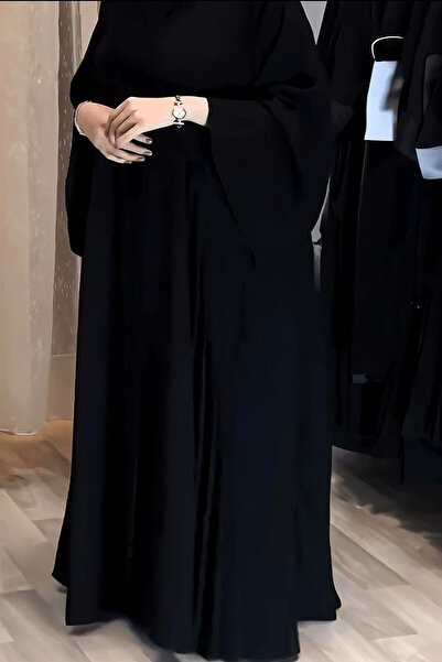 Elena Hour black crepe abaya with a hidden snap closure and an attached heads...