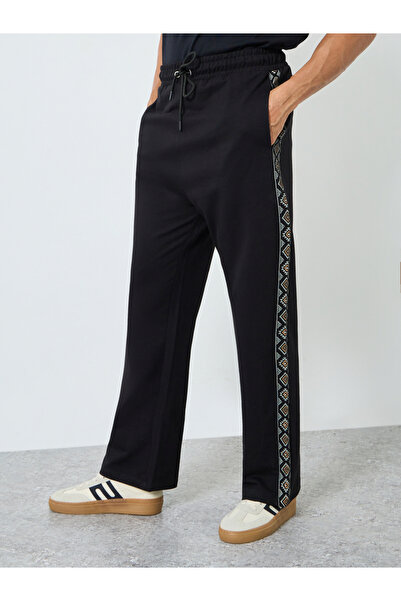 Styli Men Black Oversized Terry Printed Panel Joggers