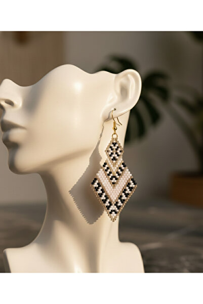 Takıcınız أقراط مييوكي مصنوعة يدويًا