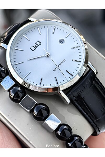 Q&Q ساعة يد رجالية من الجلد باللون الأبيض الرجعي مع تقويم العلامة التجارية، ض...