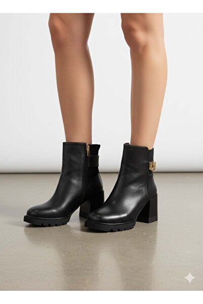 Luvesta Shoes حذاء بكعب ذهبي اللون أسود