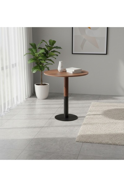 DEC4 A cafe table with a distinctive and modern circular design.