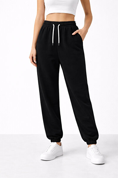 NAKRUF Women's Black Sweatpants with Elastic Legs, Comfortable Cut, Cotton In...