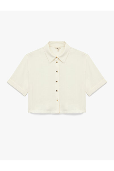 Koton قميص قصير الأكمام من قماش ايروبين ذو قصة عادية