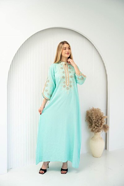 Greenko Qamar embroidered jalabiyas, a royal symbol of luxury.