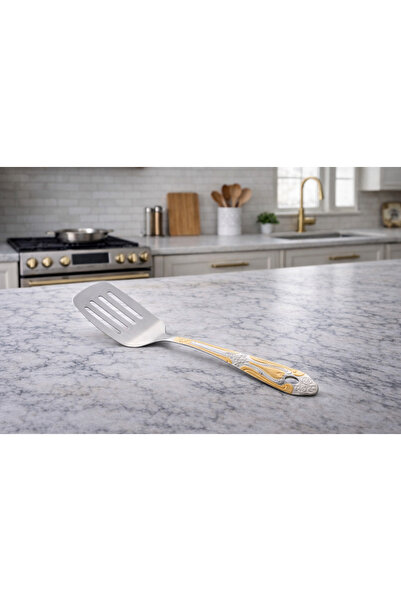 Dania Decorative stainless steel frying spoon… a touch of luxury for your kit...