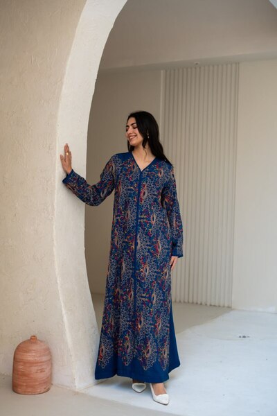 Braids Jalabiya with intricate artistic details and an elegance that emulates...