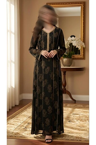 ISHRAQAT AL-AMAL A long dress with long, slightly wide sleeves, decorated wit...