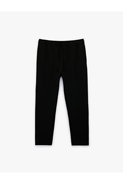 Koton Pantaloni din material textil cu șireturi în talie și buzunare, cu potr...