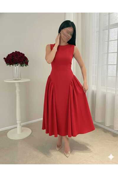 Riva A stylish and uniquely designed red midi dress.
