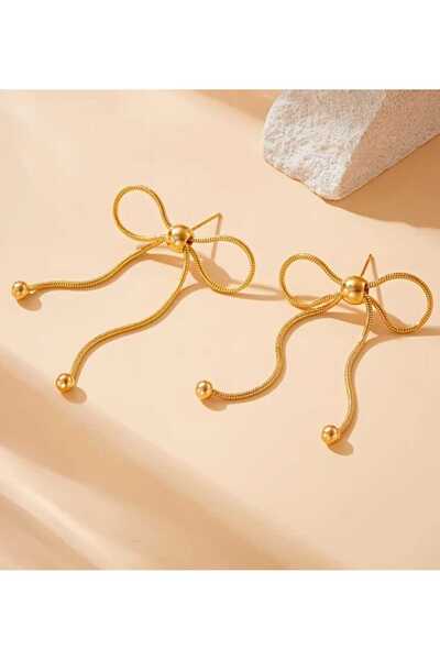 Ivory Pearl أقراط فولاذية على شكل فيونكة ذهبية اللون