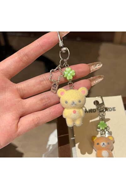 Miniso سلسلة مفاتيح ريلاكوما بيضاء لطيفة على شكل دب صغير مخملي، مصنوعة من الر...